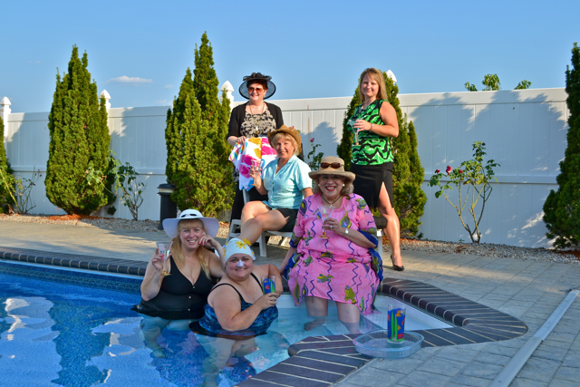 The cast of The Dixie Swim Club. In the water: Patty Kotlicky (Vernadette), Karen McKaig (Jeri Neal), Debby Stanuch (Dinah). Back: Deb Smith (director), Carol Eberhard (Sheree), Angie Cotter (Lexie).