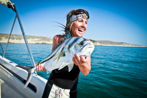 Kim Singer with a Rooster Fish